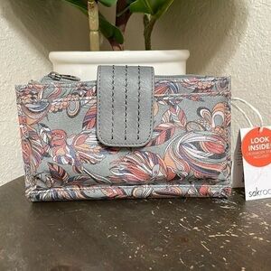 The Sak compact crossbody purse